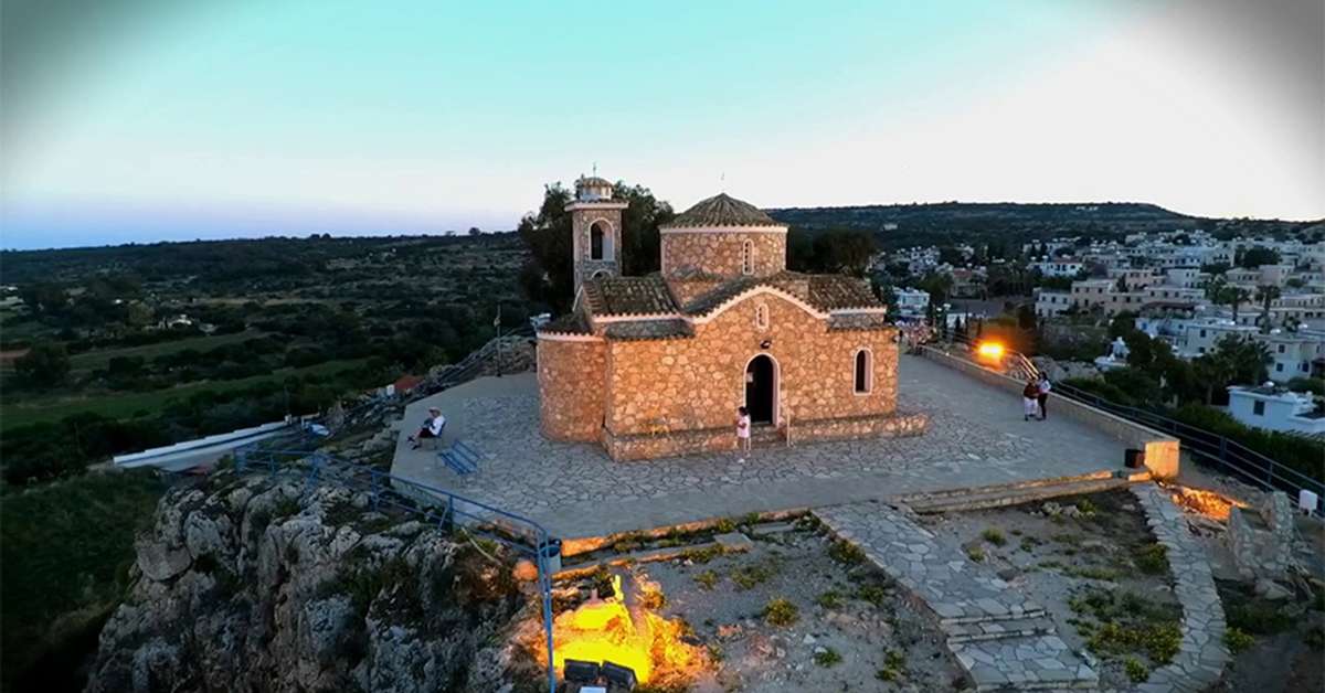 Profitis Elias chapel Protaras — hilltop stone church at dusk with panoramic views