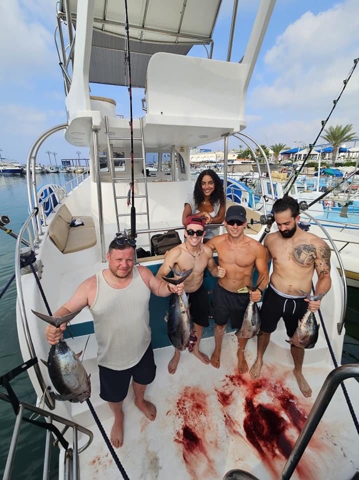 Group holding tuna catch Ayia Napa fishing trip