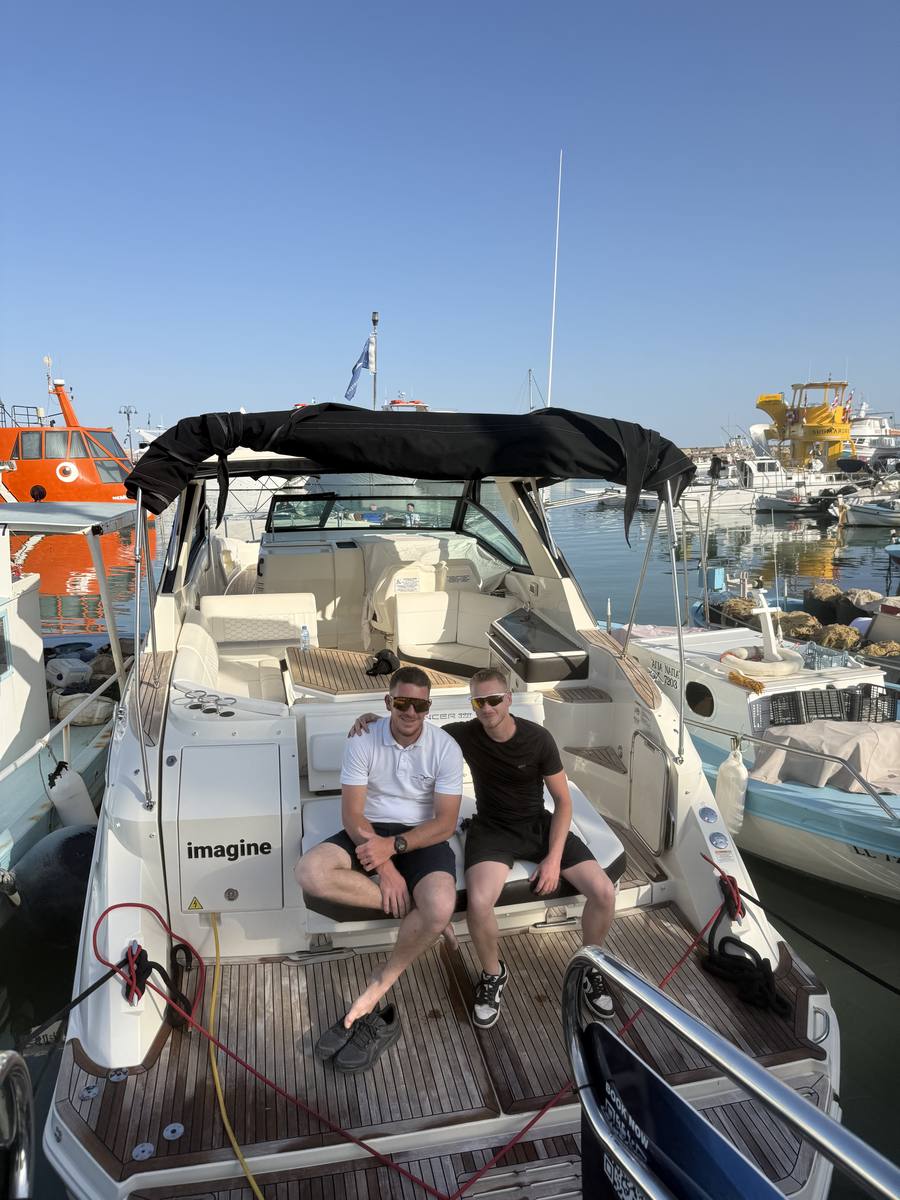 Alex and Captain Yianis aboard the Sea Ray 320 in Ayia Napa harbour