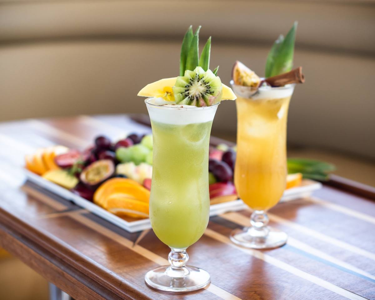 Tropical cocktails and fresh fruit on board Ocean Queen
