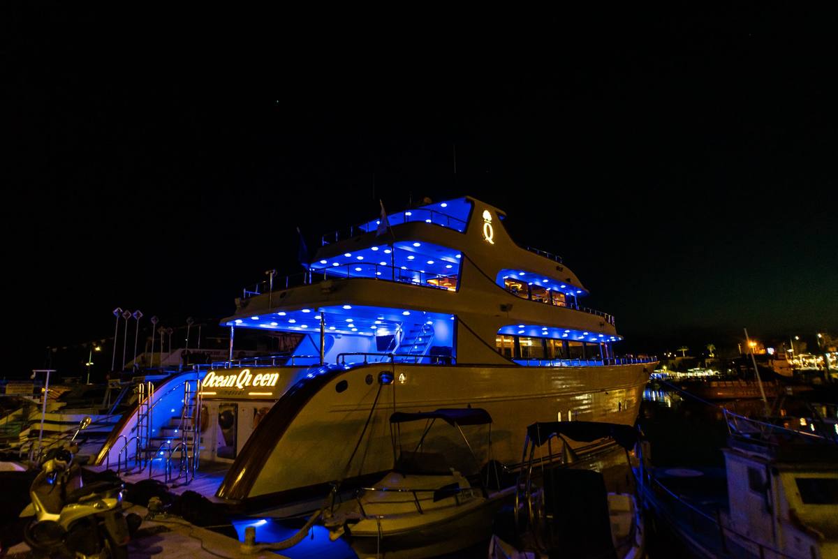 Ocean Queen lit up at night in Ayia Napa harbour